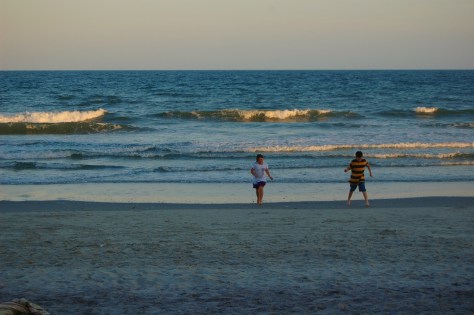 Twilight at Holden Beach. One last romp with the waves. Photograply copywrighted by Barbara Mattio 2013