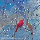 Mated cardinals on a budding tree photographed and copyrighted by Barbara Mattio  2013