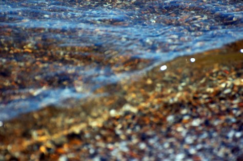 Pebbles through the  water