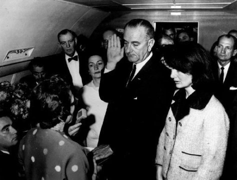 Johnson taking oath of office on Air Force One