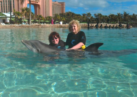 Jill the dolphin, myself and my sister Amy.