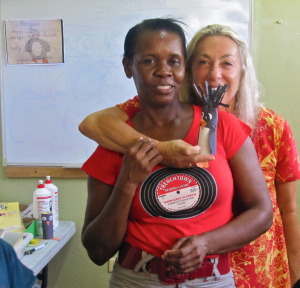 Teacher Joan with Roslyn peeping over her shoulder…and the inevitable penguin. (My photo)