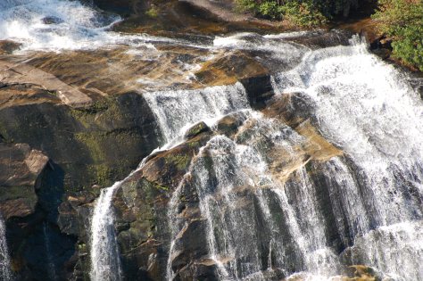 Layers of rock divide the water. Photograph and copygraph by Barbara Mattio, 2016