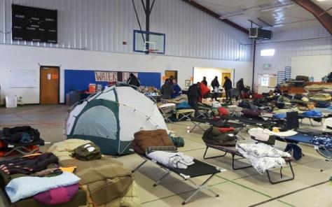 Remaining activists keep warm inside, at an emergency center, as they are grappling with plunging temperatures that make conditions more difficult at the protest camp in Cannon Ball, North Dakota, December 14, 2016. Picture taken December 14, 2016. REUTERS/Valerie Volcovici