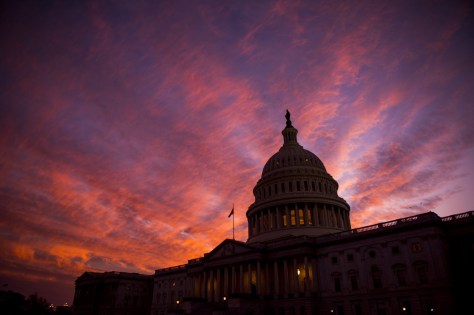 The sun sets at the U.S. Capitol as the 114th session of Congress comes to a close on Thursday, December 08. The House passed a spending bill to fund the government through April before heading home for the holiday recess. Getty